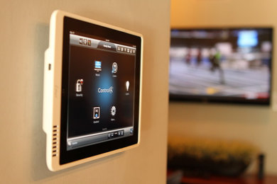 Home theater - contemporary home theater idea in Jacksonville