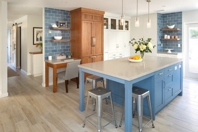 Design Studio West - Modern Mix of Blue, White and Wood Tone