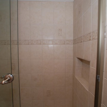 Kohler Devonshire Tub With Recessed Shampoo Shelf & Tall Shower Doors