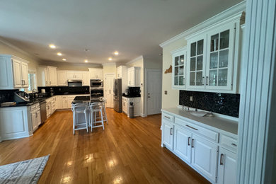 Example of a large minimalist kitchen design in Other