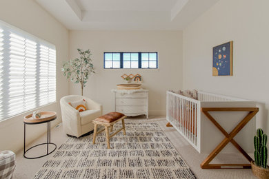 Nursery - transitional gender-neutral carpeted, white floor and tray ceiling nursery idea in Other with white walls