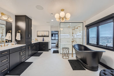 Example of a large minimalist master gray tile porcelain tile, gray floor and double-sink bathroom design in Denver with shaker cabinets, black cabinets, a bidet, gray walls, an undermount sink, quartz countertops, a hinged shower door, white countertops and a built-in vanity