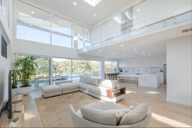 Photo of a contemporary living room in Newcastle - Maitland.