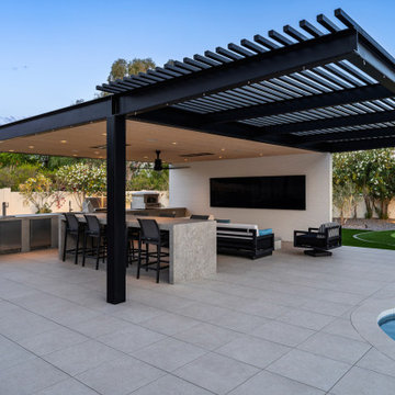 Contemporary Outdoor Escape in Scottsdale Spa, Outdoor Bar & Luxury Waterfall