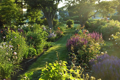 Inspiration for a contemporary partial sun landscaping in Portland Maine for summer.