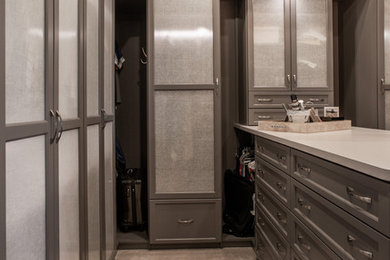 Example of a transitional closet design in Other