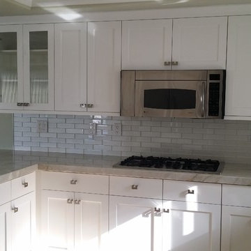 Kitchen Renovation of cabinets with full overlay and counter tops.