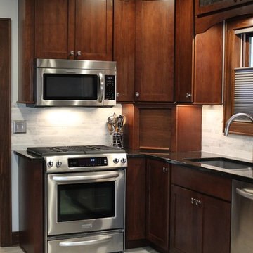 Davenport- Kitchen Remodel pairs Neutral Grays with Rich Cherry Cabinets
