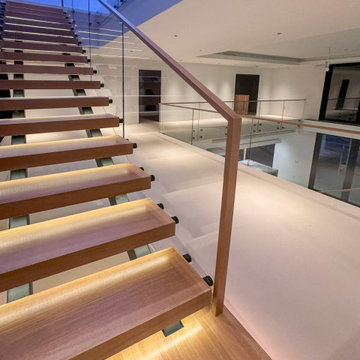 Project #126 | Contemporary Staircases with Integrated LEDs & Glass Railing