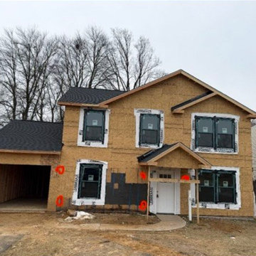 Wood composite and vinyl siding exterior