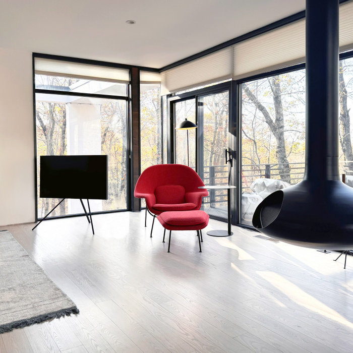 Curated furniture, a refreshed wood floor color, and thoughtful layout updates blending modern elegance with cozy charm.
