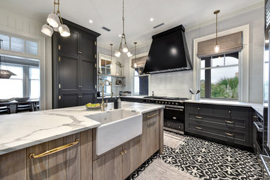 Enclosed kitchen - mid-sized country l-shaped cement tile floor and multicolored floor enclosed kitchen idea in Charleston with a farmhouse sink, recessed-panel cabinets, black cabinets, marble countertops, gray backsplash, subway tile backsplash, stainless steel appliances, an island and white countertops