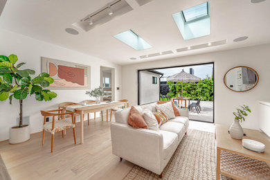 Minimalist open concept living room photo in Los Angeles