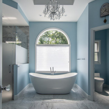 Traditional Master Bath Utilizing Frosted and Clear Glass