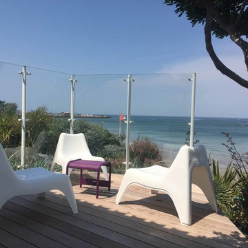 Pare-vent en verre sans cadre réalisé sur l'île de Noirmoutier.