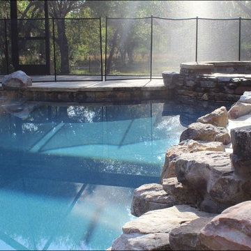 Rock Swimming Pool & Spa With Waterfall and Fire Pit