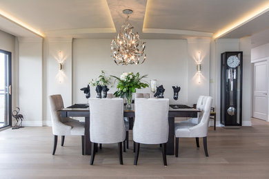 Large trendy light wood floor great room photo in Toronto with white walls