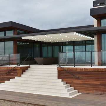 Infinity Canopy creates a transitional space at this luxury beach house