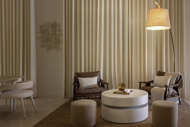 Inspiration for a large contemporary formal and open concept travertine floor and beige floor living room remodel in Orange County with white walls, no fireplace and no tv