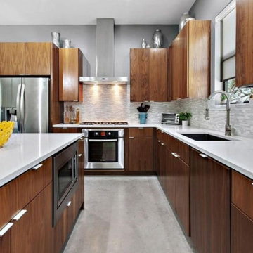 High End Walnut Kitchen with White Countertops