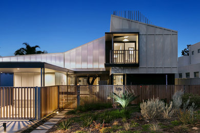 Inspiration for a large modern two-storey house exterior in Perth with a metal roof.