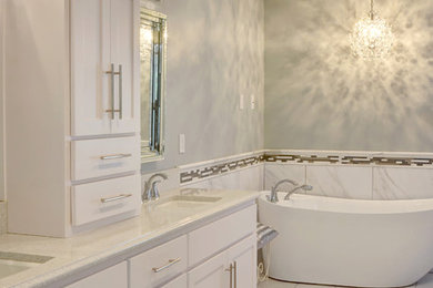 Inspiration for a mid-sized transitional master red tile white floor bathroom remodel in Kansas City with white cabinets and gray walls