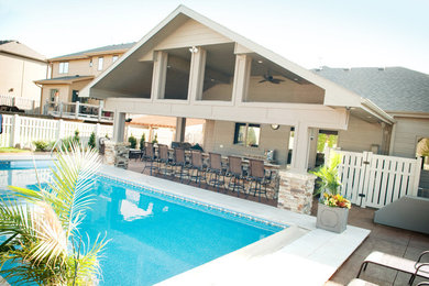 Inspiration for a large tropical pool remodel in Omaha
