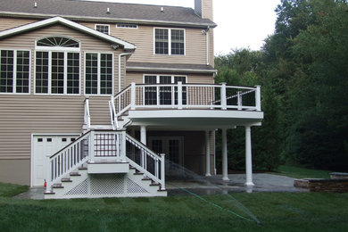 Inspiration for a large transitional backyard deck remodel in Baltimore with no cover