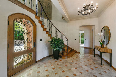 Example of a tuscan home design design in San Francisco