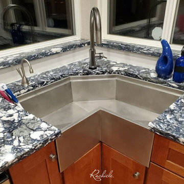 Corner sinks and corner sink kitchens