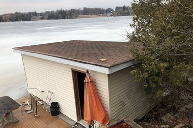 Example of an exterior home design in Other