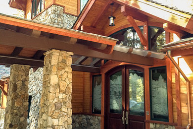 Large transitional brown two-story mixed siding exterior home idea in Sacramento with a shingle roof