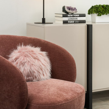 Comfy Relaxation in a Terracotta Swivel Chair
