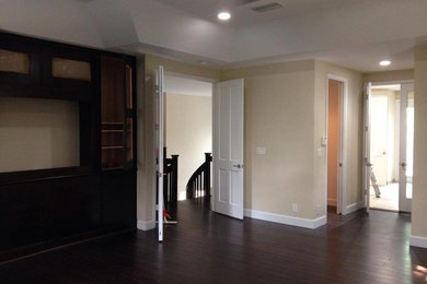 Example of a bedroom design in Miami with beige walls