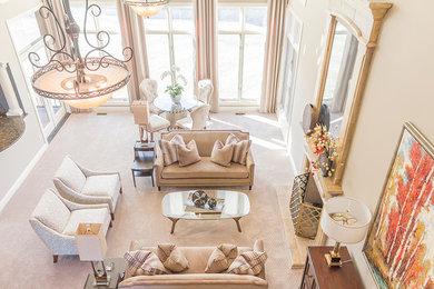 Large transitional open concept carpeted living room photo in St Louis with beige walls, a standard fireplace and a stone fireplace
