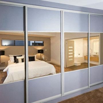 Ample Storage & Reflection with Our Bronze Mirror Sliding Wardrobe in Arlington