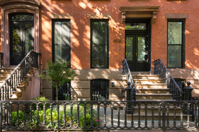 Example of a large trendy home design design in New York