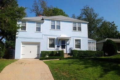 Example of a mid-sized classic blue two-story wood exterior home design in Oklahoma City