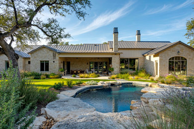 Home design - french country home design idea in Austin