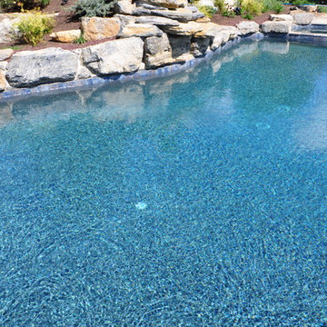In Ground pool with Boulder Waterfall and Large Spa
