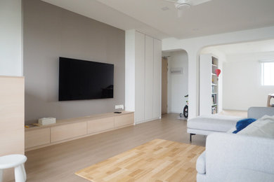 This is an example of a scandinavian family room in Singapore.
