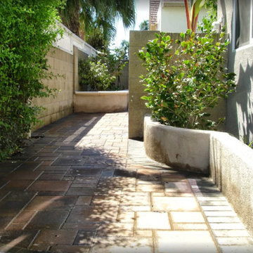 Custom Fire Pit, Fountain, Seat Wall, and Paver Installation