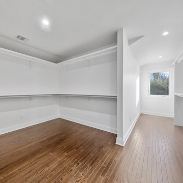 Walk-In Closet with Wraparound Shelving