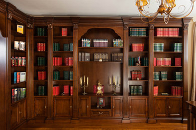 Example of a mid-sized classic home office design in Other