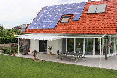 Moderne Pergola Terrasse in Sonstige
