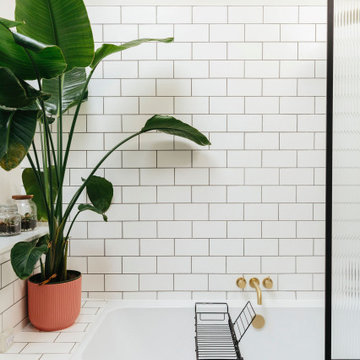 Pink & green bathroom with mix of tiles & patterns
