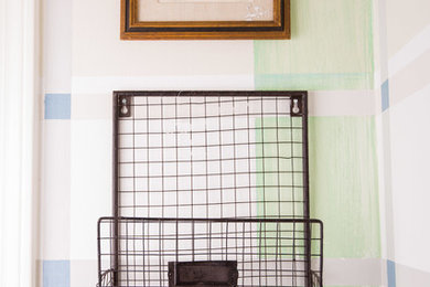 Entryway - small coastal entryway idea in Louisville with green walls