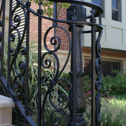 Solid stone stairs with ornamental iron railing - Products