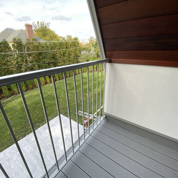 White Oak Stairs with Polished Stainless Steel Balusters