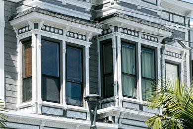 Inspiration for a large victorian gray one-story gable roof remodel in San Francisco